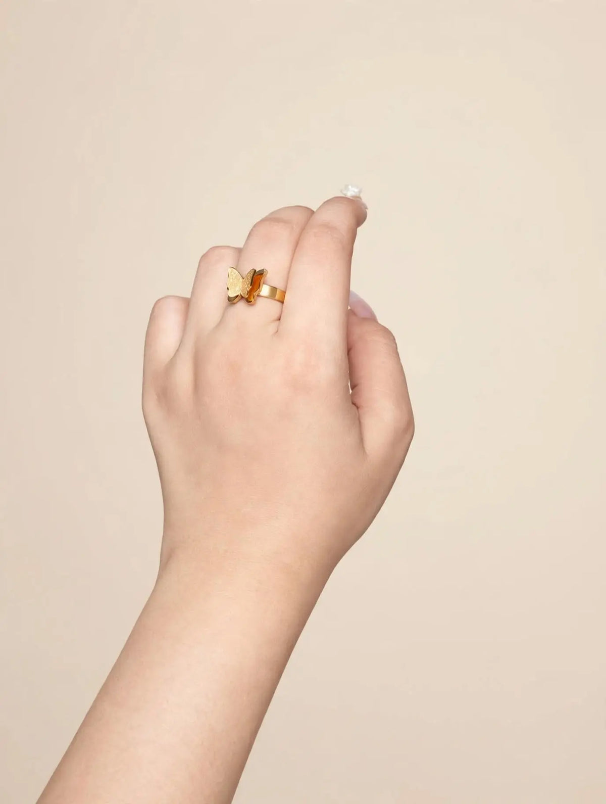 LUVORA Butterfly Bliss Ring on finger - gold butterfly ring