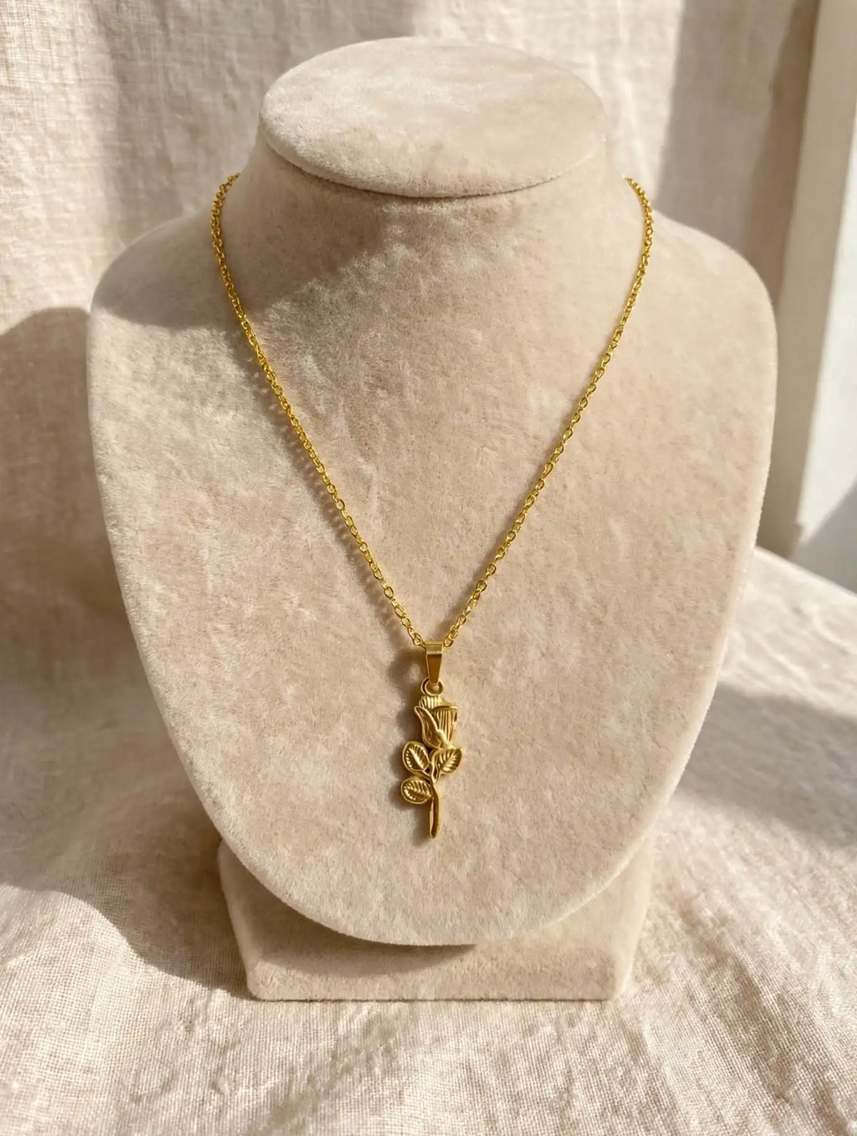 LUVORA Blooming Rose gold pendant necklace on beige bust - anti tarnish necklace for women
