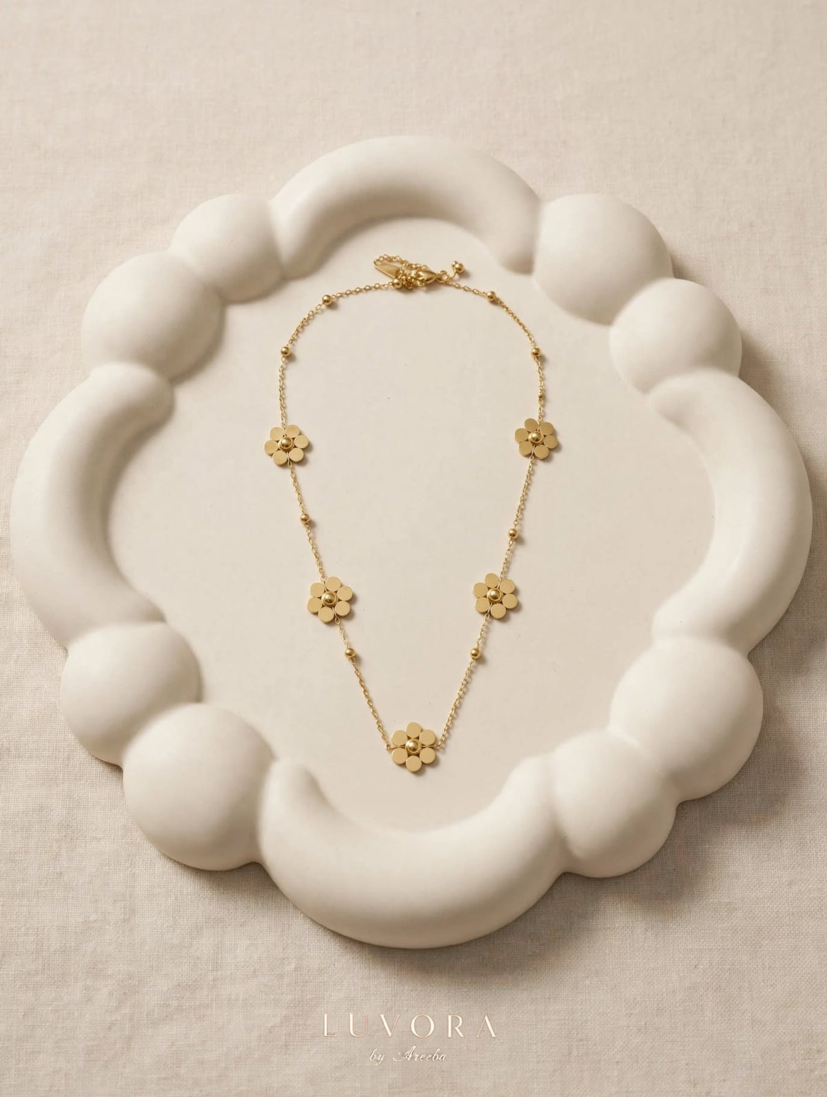 LUVORA 5 petal gold flower necklace minimal dainty chain with small gold flowers - anti tarnish waterproof jewelry Pakistan