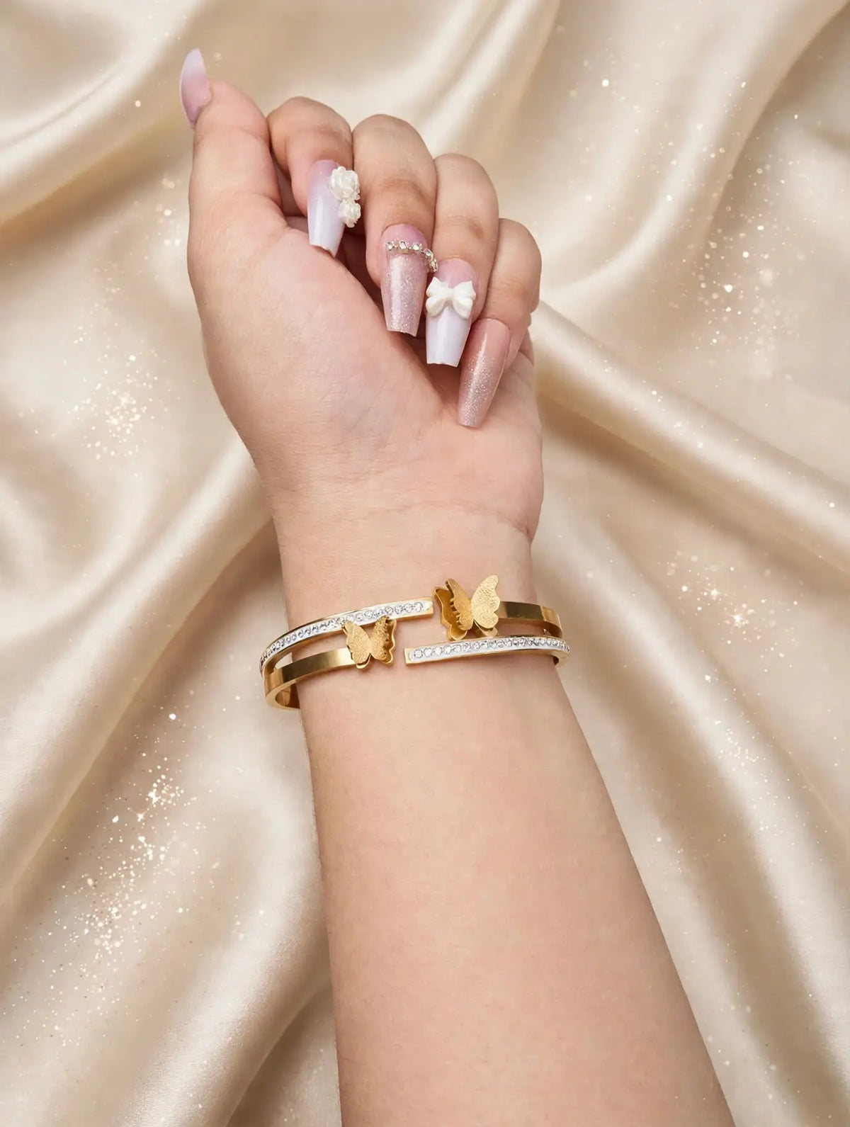 LUVORA Butterfly Bracelet on woman wrist - gold butterfly bliss bracelet styled look