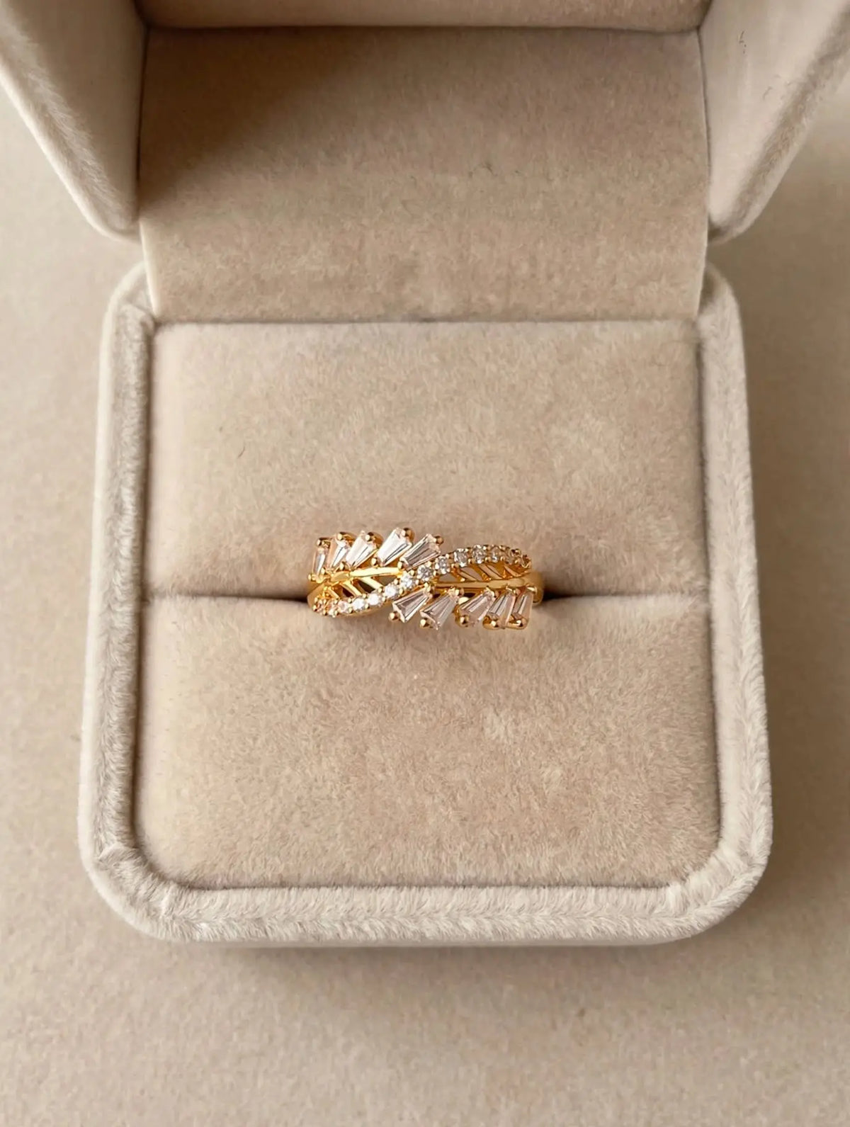 LUVORA Gold Leaf Crystal Ring in beige velvet jewelry box - adjustable gold plated leaf ring with baguette crystals